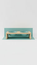 Cat feeding station with natural wood and minted teal bowls